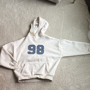 Women's Cream Hoodie with Blue Graphic